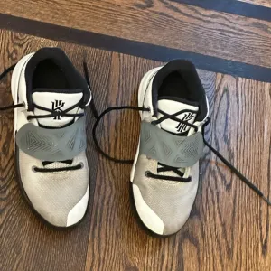 5 Youth Nike shoes - Velcro and laces - black, gray, and white