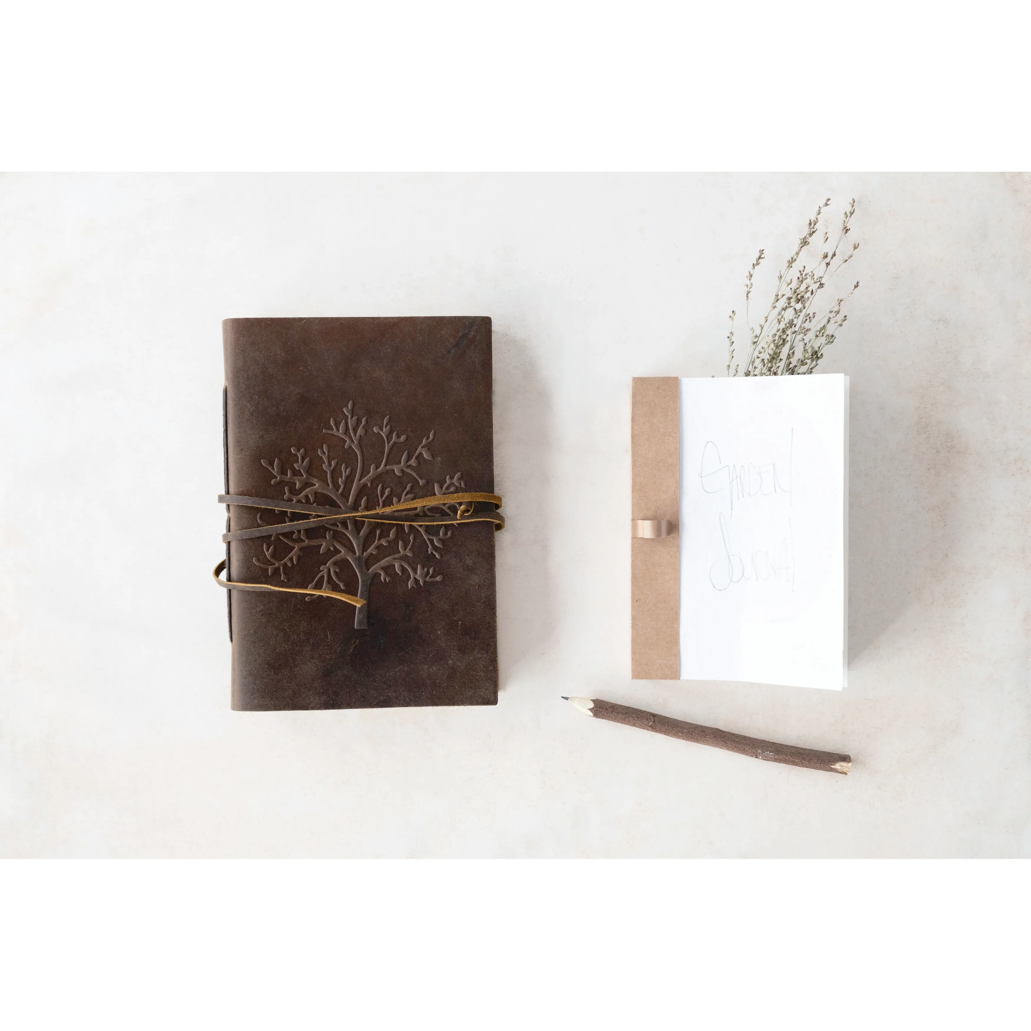 Brown leather journal with handmade paper