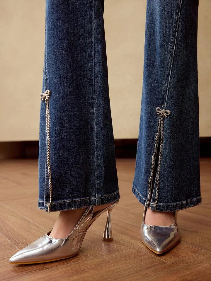CM-BS671797 Women Elegant Seoul Style Rhinestone Bow Chain Detail Split Hem Flare Leg Denim Jeans