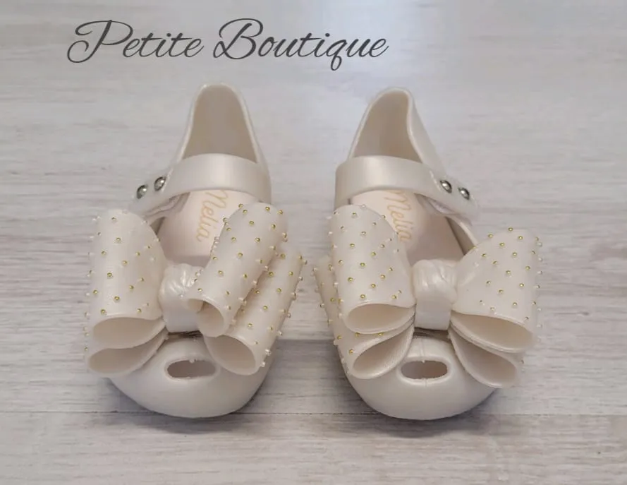 Pearl bow jelly shoes