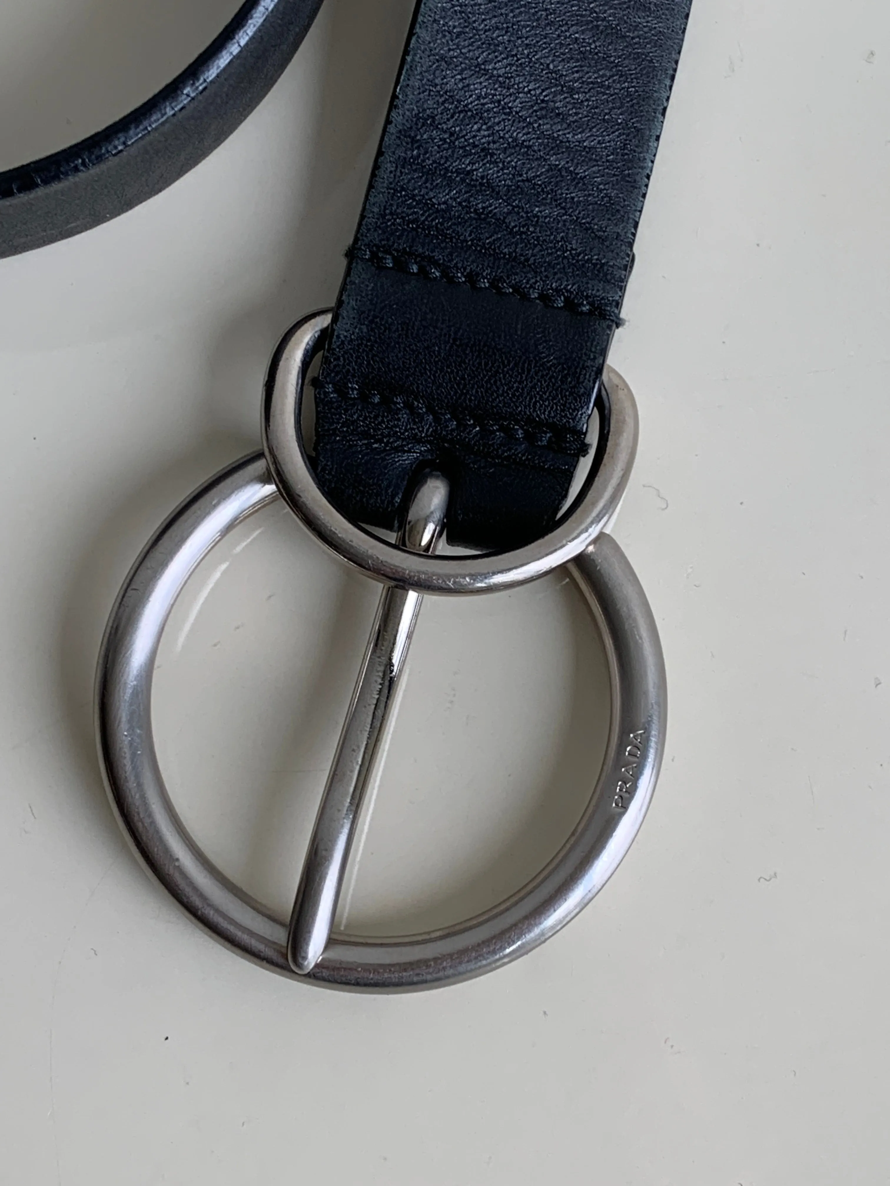 silver ring Prada belt